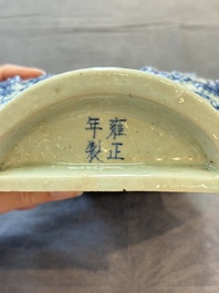 A pair of Chinese blue and white celadon-ground 'Buddhist lions' wall pocket vases, Yongzheng mark, 19/20th C.