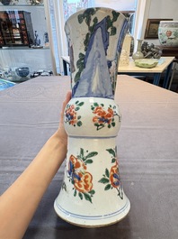 A Chinese wucai 'gu' vase and a blue and white brush pot, Transitional period and later