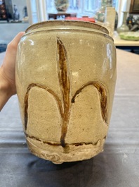 An Annamese or Vietnamese brown-glazed cream-ground 'grass sprigs' jar, 12/13th C.