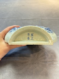 A pair of Chinese blue and white celadon-ground 'Buddhist lions' wall pocket vases, Yongzheng mark, 19/20th C.