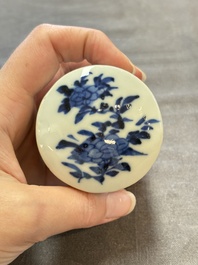 A pair of Chinese blue and white tea caddies and covers, 19th C.