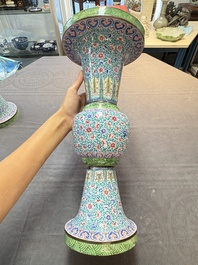A pair of Chinese Canton enamel 'gu' vases with floral design, Qianlong
