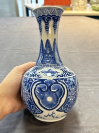 A Chinese blue and white vase with floral design, 19th C.