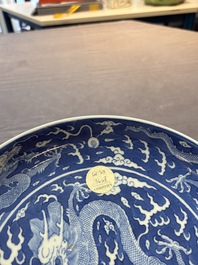 A Chinese blue and white 'dragon' dish, Daoguang mark and period
