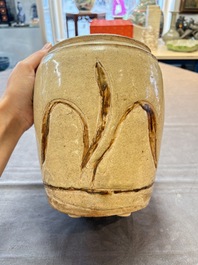 An Annamese or Vietnamese brown-glazed cream-ground 'grass sprigs' jar, 12/13th C.