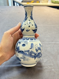 A Chinese blue and white 'playing boys' double gourd vase, Transitional period