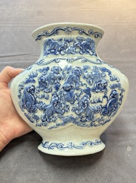 A pair of Chinese blue and white celadon-ground 'Buddhist lions' wall pocket vases, Yongzheng mark, 19/20th C.