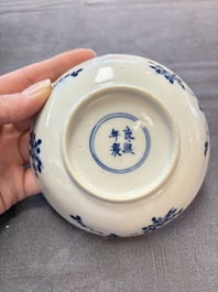 Ten Chinese blue and white cups and nine saucers, Kangxi mark, 19th C.