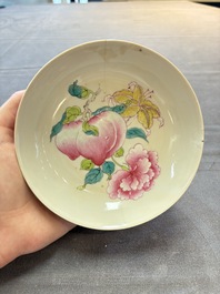 A Chinese famille rose ruby-back saucer dish with peaches and flowers, 18th C.