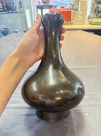 A Chinese bronze garlic-head 'hu' wine vessel, Han