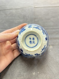Ten Chinese blue and white cups and nine saucers, Kangxi mark, 19th C.