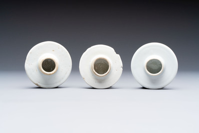 Three Chinese blue and white 'plum blossom' vases and covers, Kangxi mark, 19th C.