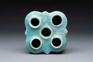 A Nishapur turquoise-glazed bowl, an inkwell and an incense burner or lantern, Iran, 10/12th C.