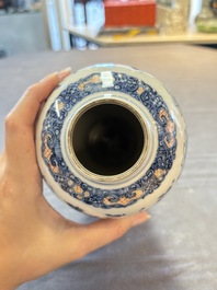 Three Chinese famille rose 'mandarin subject' vases and covers, Qianlong