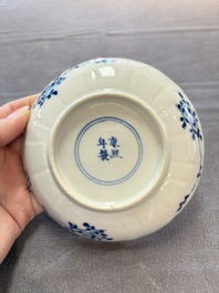 Ten Chinese blue and white cups and nine saucers, Kangxi mark, 19th C.