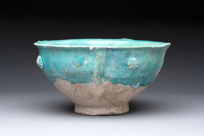 A Nishapur turquoise-glazed bowl, an inkwell and an incense burner or lantern, Iran, 10/12th C.