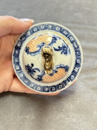 Three Chinese famille rose 'mandarin subject' vases and covers, Qianlong