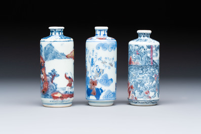 Three Chinese blue, white and copper-red snuff bottles, 19th C.