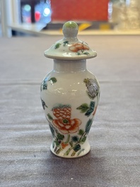 A Chinese Canton famille verte three-piece tea service and three vases, 19th C.