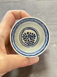 Ten Chinese blue and white cups and nine saucers, Kangxi mark, 19th C.