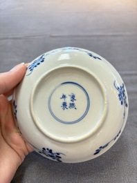 Ten Chinese blue and white cups and nine saucers, Kangxi mark, 19th C.