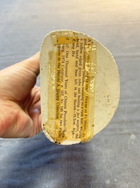 A Chinese verte biscuit Luohan holding a ruyi, Kangxi