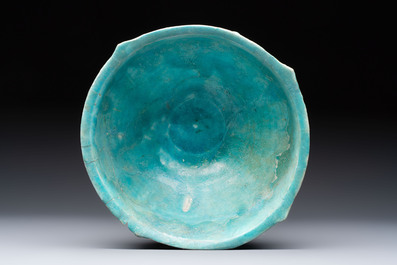 A Nishapur turquoise-glazed bowl, an inkwell and an incense burner or lantern, Iran, 10/12th C.