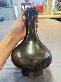 A Chinese bronze garlic-head 'hu' wine vessel, Han