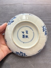 Ten Chinese blue and white cups and nine saucers, Kangxi mark, 19th C.