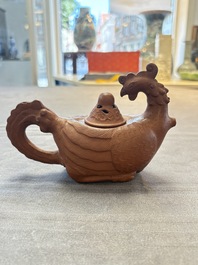 A Chinese Yixing stoneware 'phoenix' teapot, Kangxi