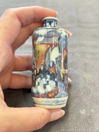 Three Chinese blue, white and copper-red snuff bottles, 19th C.
