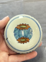 A pair of Chinese doucai 'chrysanthemum' jars and covers, Daoguang mark and of the period