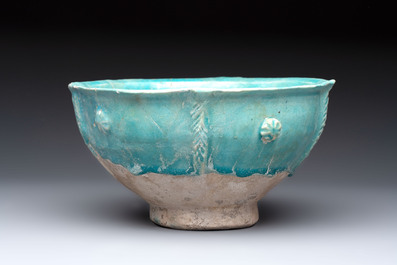 A Nishapur turquoise-glazed bowl, an inkwell and an incense burner or lantern, Iran, 10/12th C.