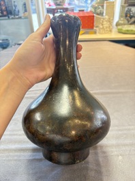 A Chinese bronze garlic-head 'hu' wine vessel, Han