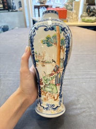 Three Chinese famille rose 'mandarin subject' vases and covers, Qianlong