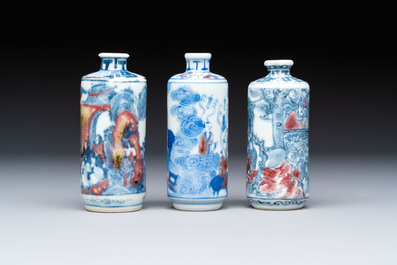 Three Chinese blue, white and copper-red snuff bottles, 19th C.