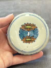 A pair of Chinese doucai 'chrysanthemum' jars and covers, Daoguang mark and of the period