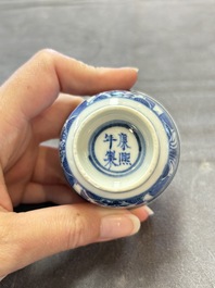 Ten Chinese blue and white cups and nine saucers, Kangxi mark, 19th C.