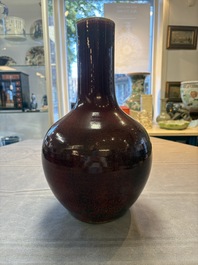 A Chinese flamb&eacute;-glazed bottle vase, 19th C.