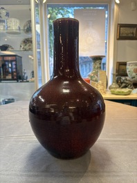 A Chinese flamb&eacute;-glazed bottle vase, 19th C.