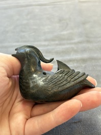 A Chinese mandarin duck-form water dropper, a hand warmer and a bronze censer, Zhen Wan 珍玩 and Zhang Mingqi Zhi 張鳴歧製 mark, 19th C.