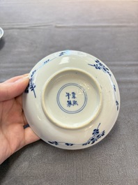 Ten Chinese blue and white cups and nine saucers, Kangxi mark, 19th C.