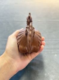 A Chinese Yixing stoneware 'phoenix' teapot, Kangxi