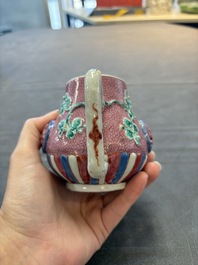 A Chinese famille rose frogspawn-ground relief-molded teapot and cover, Yongzheng