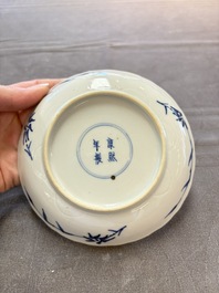 Eight Chinese blue and white cups and saucers, Kangxi mark, 19th C.