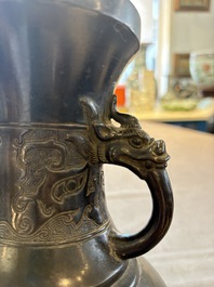 A Chinese archaistic bronze vase with 'mythical beast' handles, Yuan/Ming