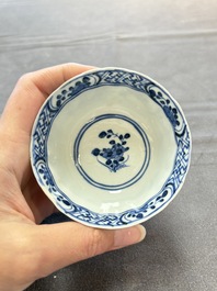 Ten Chinese blue and white cups and nine saucers, Kangxi mark, 19th C.