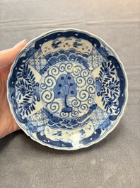 Eight Chinese blue and white cups and saucers, Kangxi mark, 19th C.