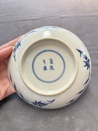 Eight Chinese blue and white cups and saucers, Kangxi mark, 19th C.