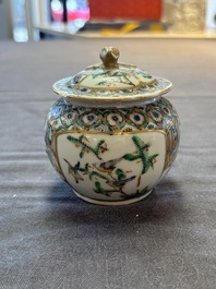 A Chinese Canton famille verte three-piece tea service and three vases, 19th C.